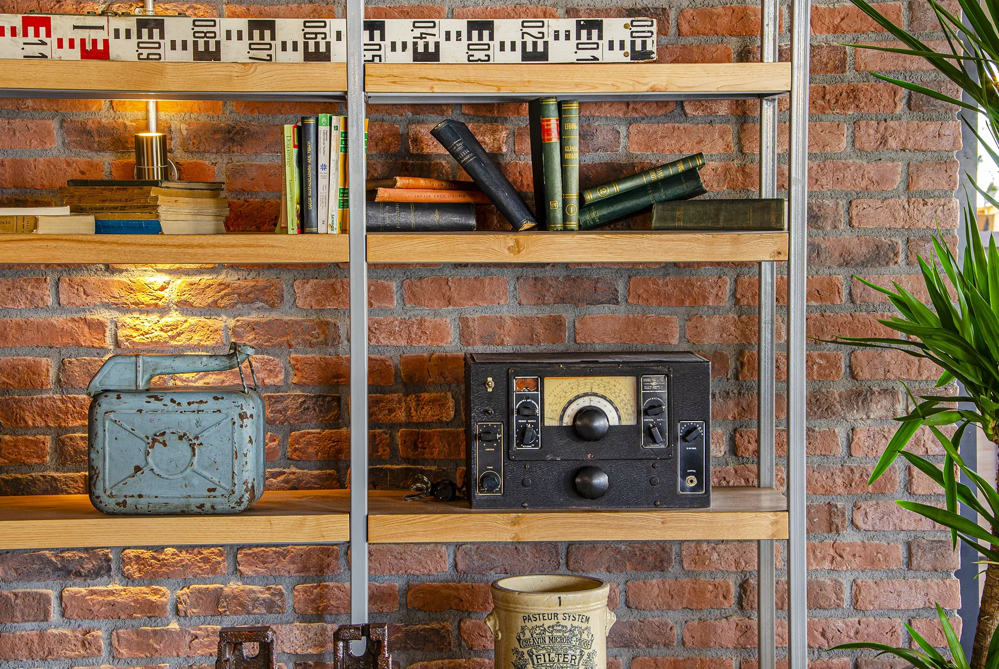 antique items and red brick wall